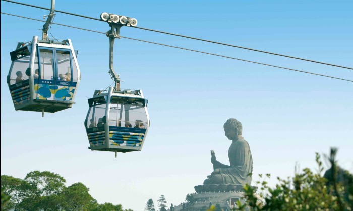 ngong ping 360 cable car in Hong Kong takes tourist from Tung Chung to the Big Buddha