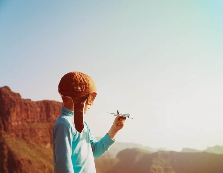 Child With Airplane traveling with kids