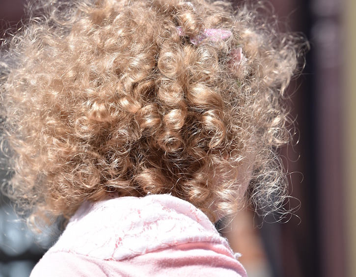 Blonde girl curly hair