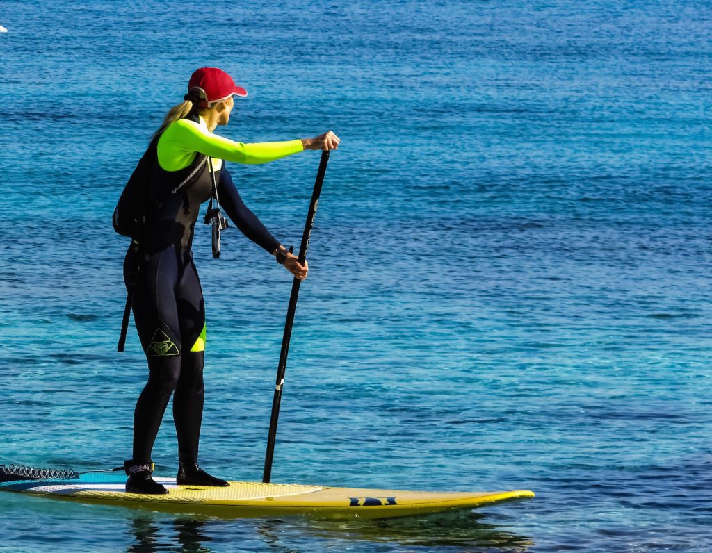 Woman paddle boarding