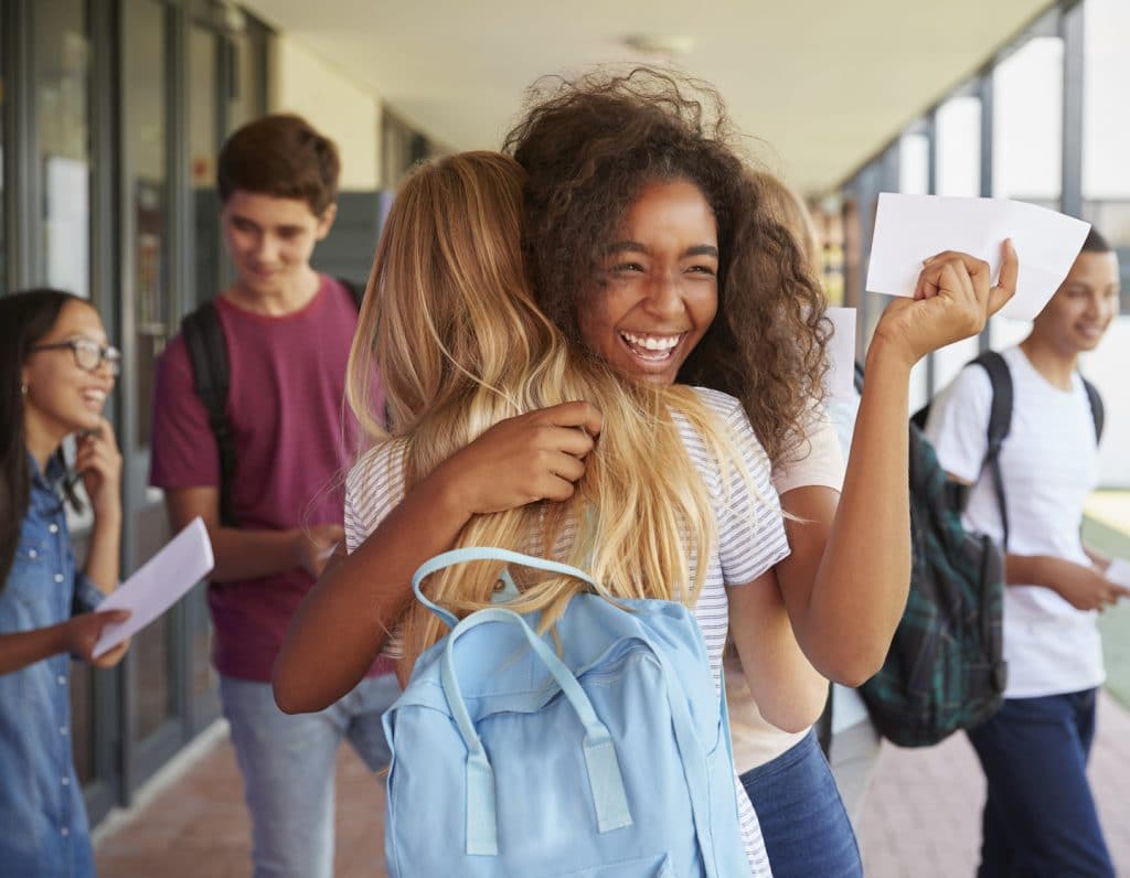 teen hugging friend advice tweens