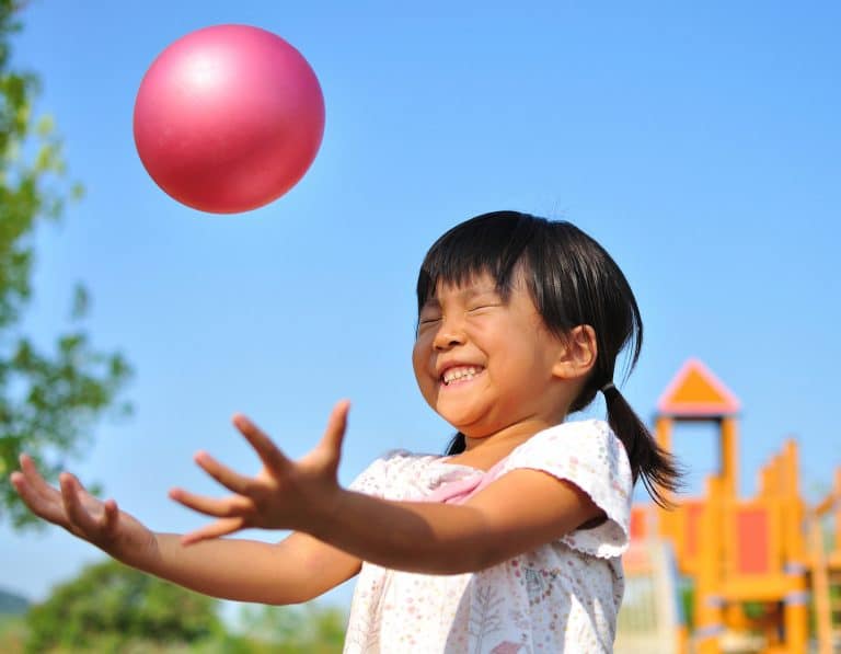 Girl's playing with ball