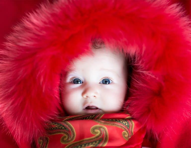 baby-products-toddler-blue eyed baby in red fur coat
