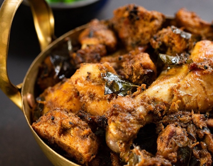 eat cooking masala roast chicken