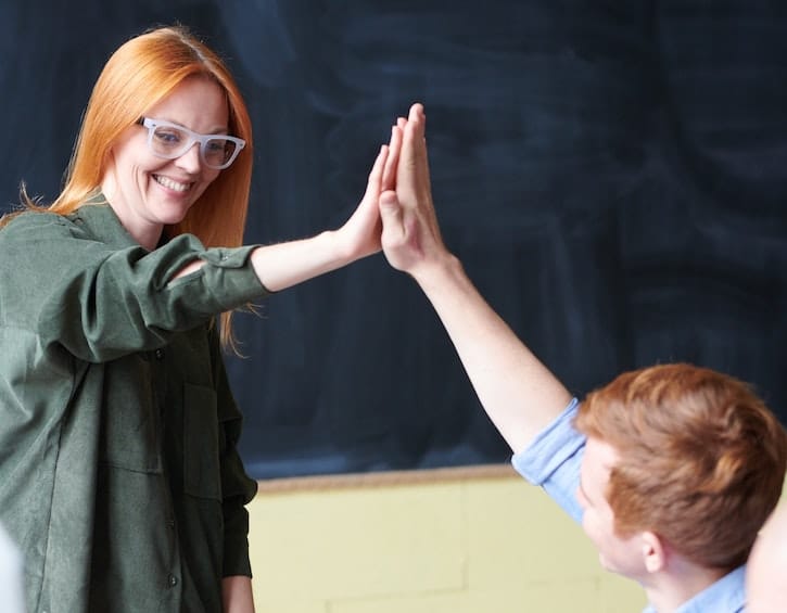 family life compliment a woman high five