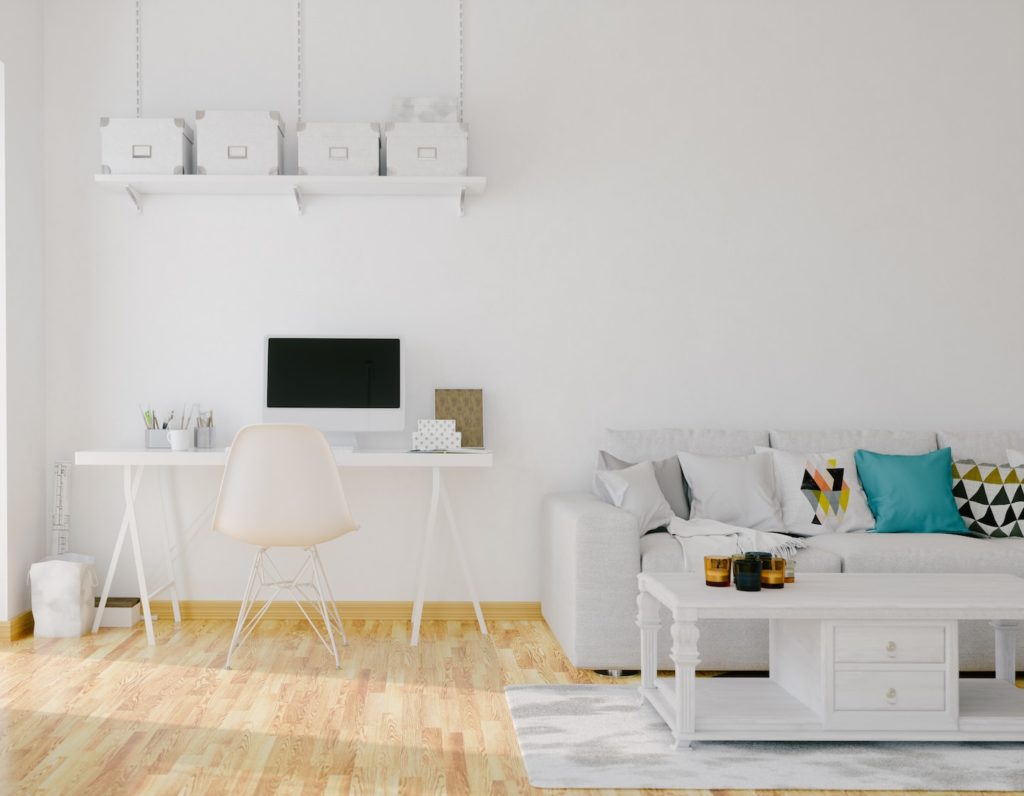 Stylish apartment divided into study and living area