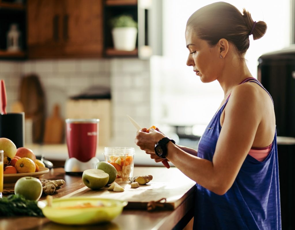 Women's health checks, fitness woman preparing healthy food