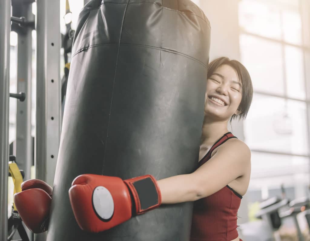 Teen fitness classes in Hong Kong girl in a boxing class