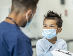 Child getting a coronavirus test in Hong Kong