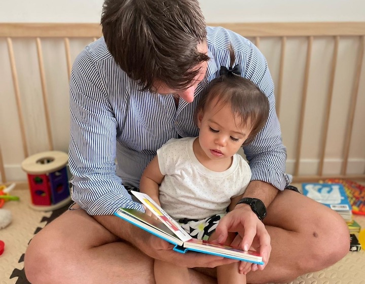 Baby and daddy at home because of COVID restrictions