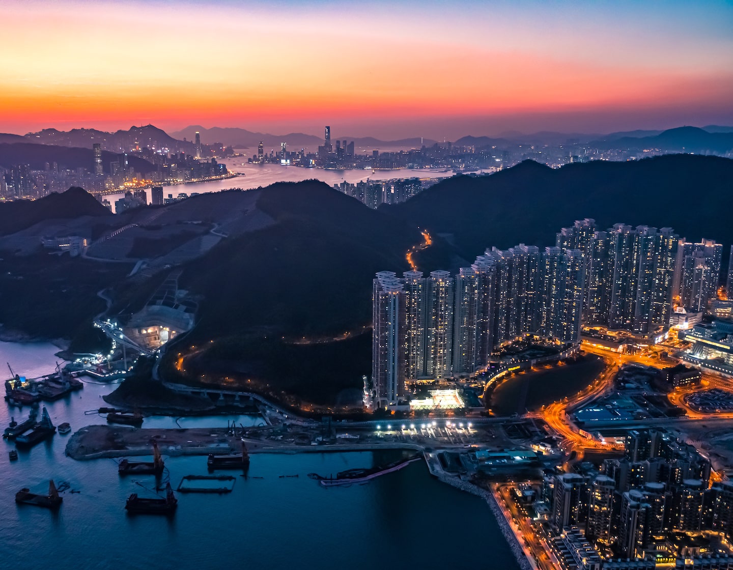 aerial view of Tseung Kwan O residential area at sunset with views to Hong Kong Island and Kowloon in the background