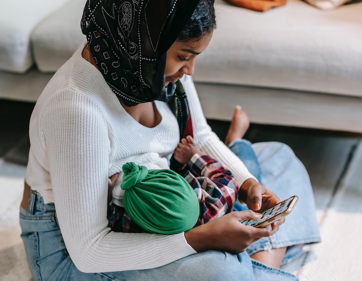 Mother breastfeeding her baby, how to improve milk supply 