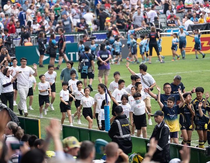 kids march past hong kong rugby sevens