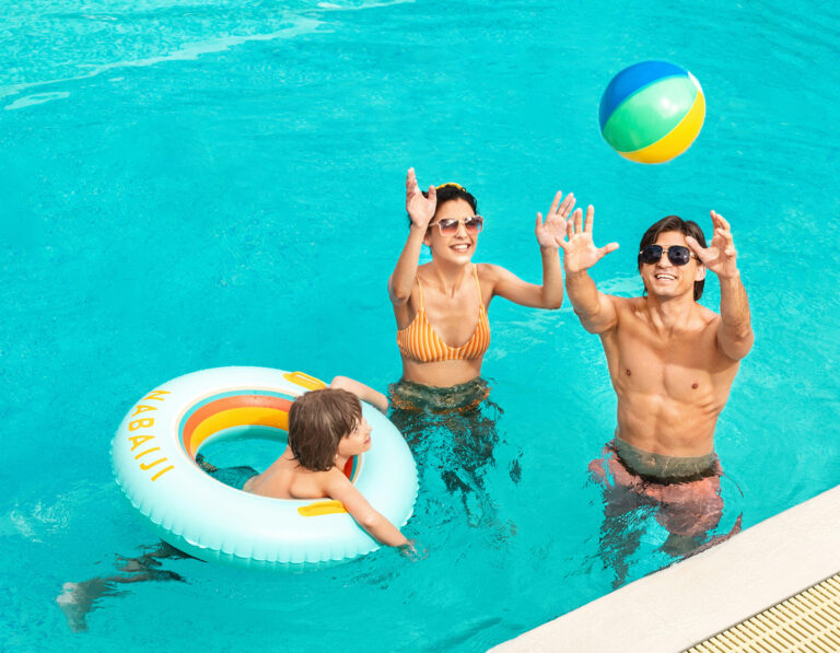 Family enjoying a daycation at a Hong Kong hotel swimming pool