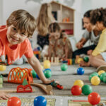 young kids and teacher in a playgroup, best playgroups in hong kong for babies infants and toddlers