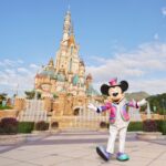 Hong Kong Disneyland Mickey Mouse in front of the Sleeping Beauty Castle