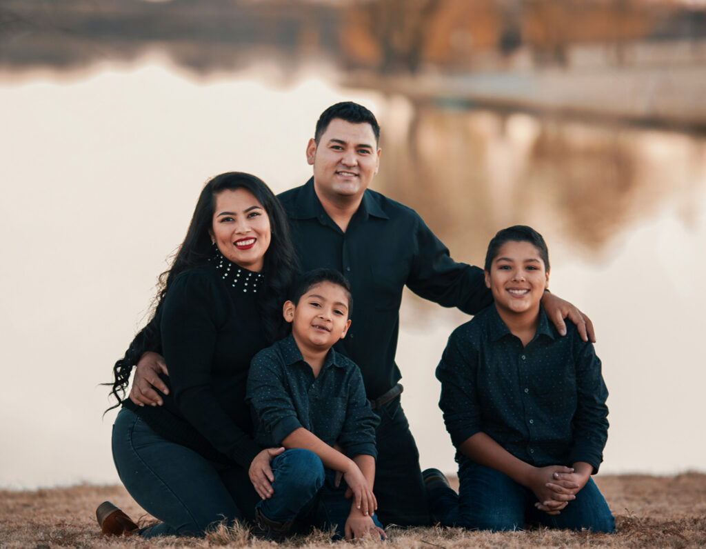 family photo with parents and two children, where to find a Family Photographer in Hong Kong for photo studio portraits for families hk