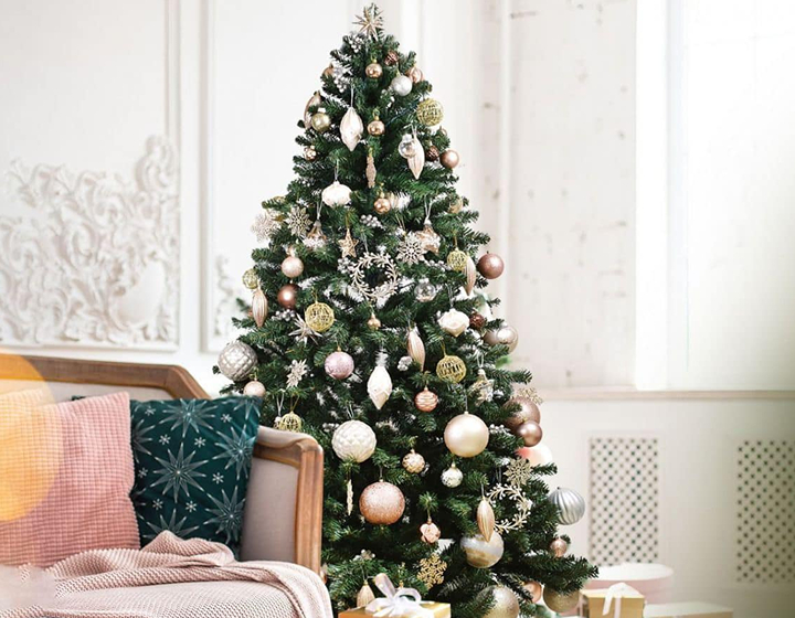 decorated christmas tree in a home with presents by gift flowers hk, where to buy christmas trees in hong kong