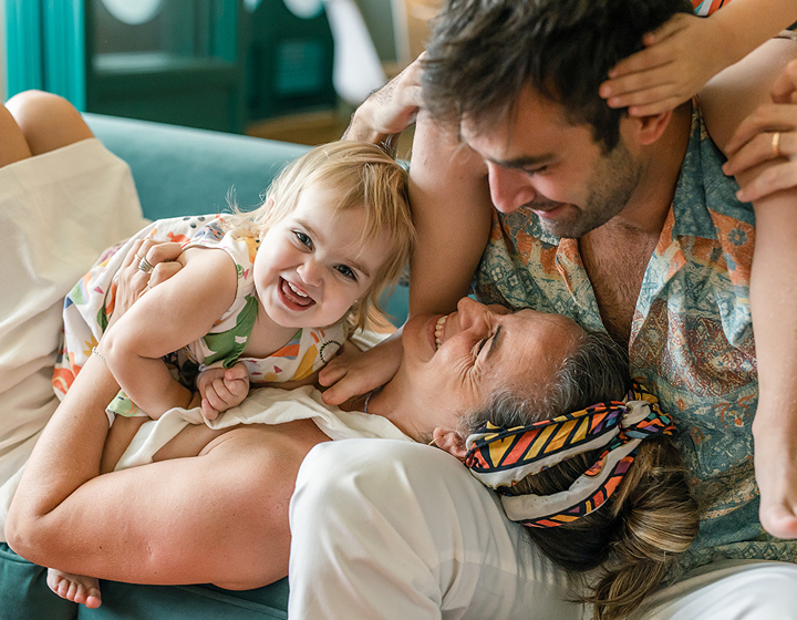 family laughing together in ayelen alcover's family photography session hong kong family photographer to capture joy and love