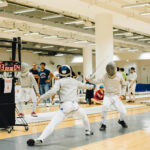 hong kong fencing schools for kids, two fencing students in a tournament in HK