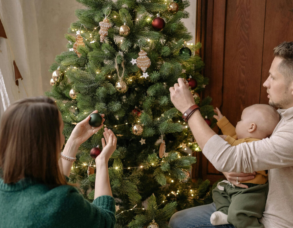 family decorating a christmas tree, where to buy christmas trees in hong kong