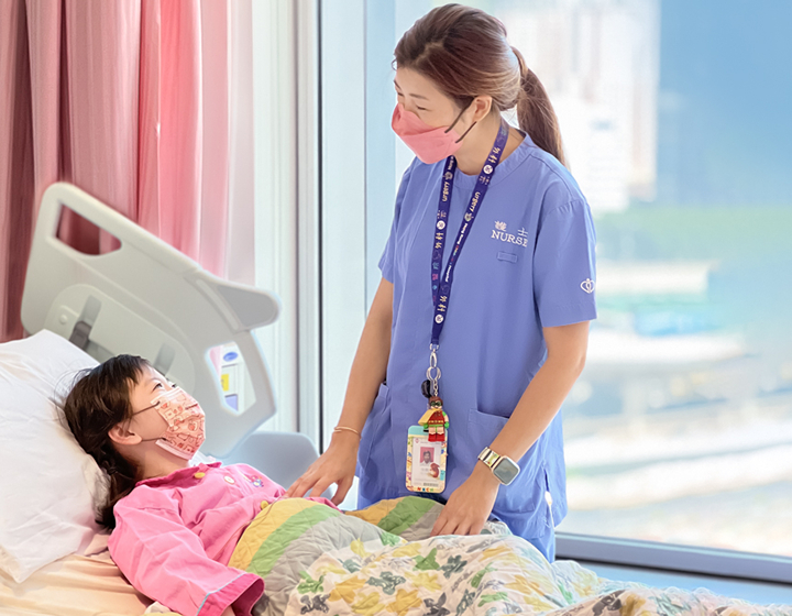 doctor and patient at a childrens hospital, hong kong childrens hospital