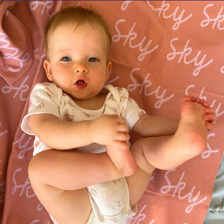 Gift Ideas For Kids, Christmas Gift Guide 2025: TinyBitz personalised blanket for baby name on swaddle