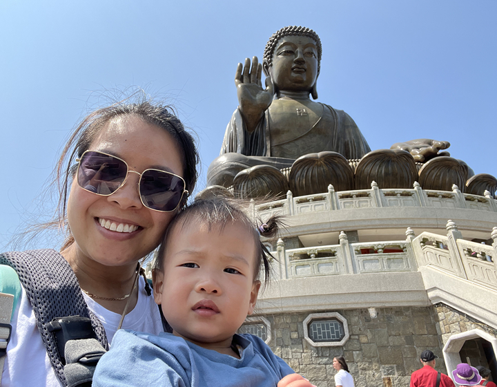 Family Friendly guide to Lantau Island Hong Kong: Big Buddha, mother and child in front of Tian Tian Buddha