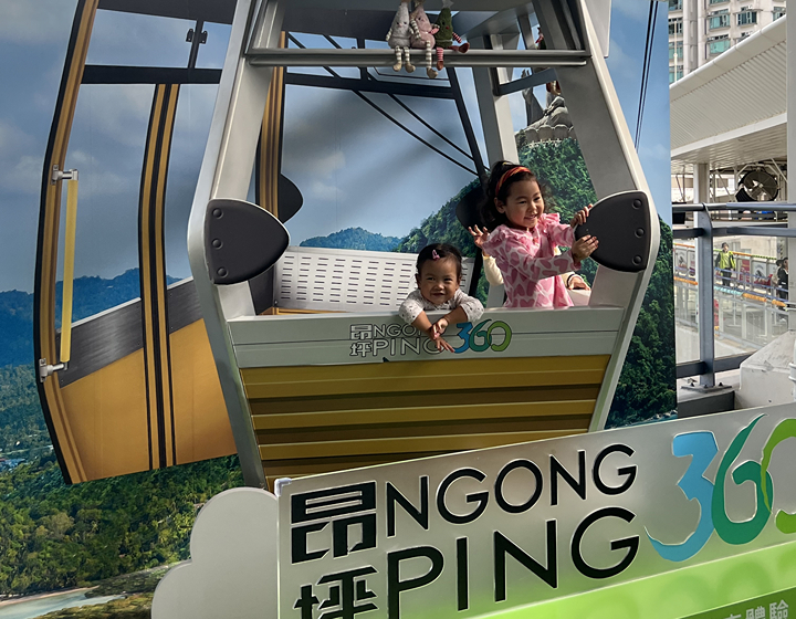 Family Friendly guide to Lantau Island Hong Kong: Ngong Ping Cable Car Terminus, cable with children inside
