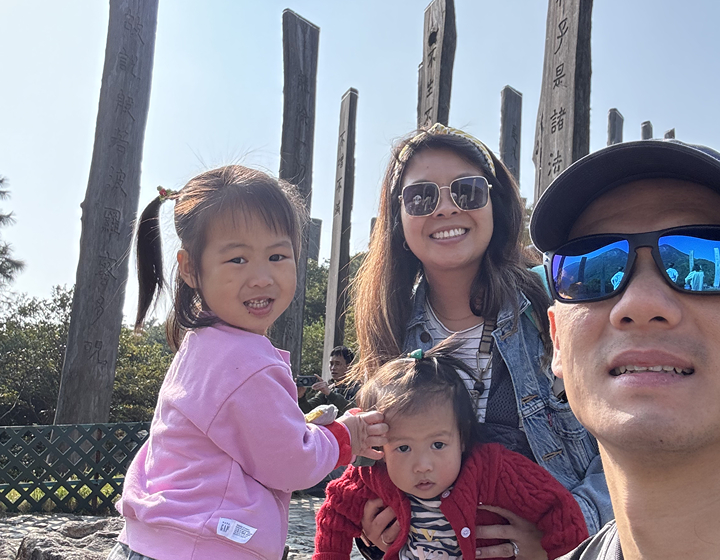 Family Friendly guide to Lantau Island Hong Kong: Ngong Ping Village, family in front of Wisdom Path