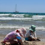 children playing on the beach in Spain