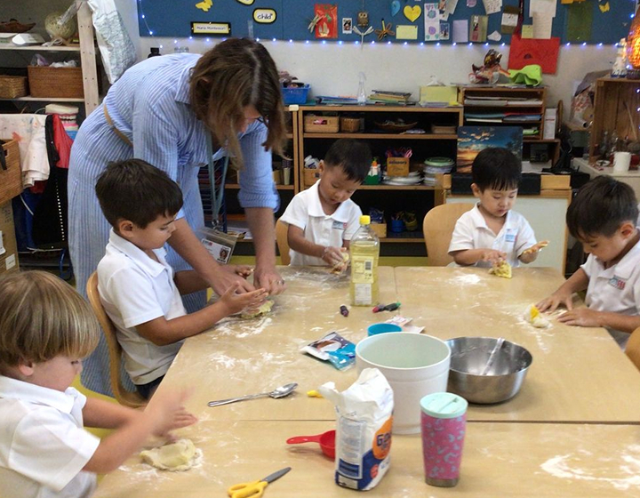 Hong Kong Academy, The Maker's Atelier, Pre-K students in cooking class, working with dough