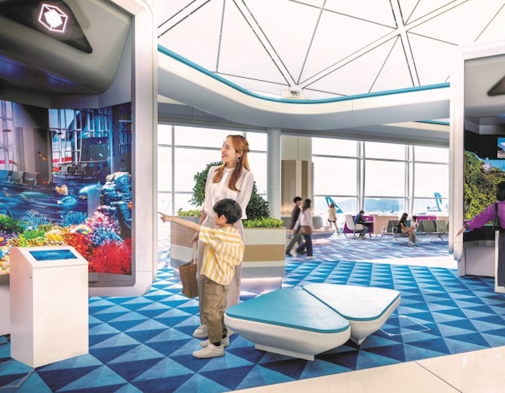 a mother and child play at the interactive themed zones at Hong Kong airport