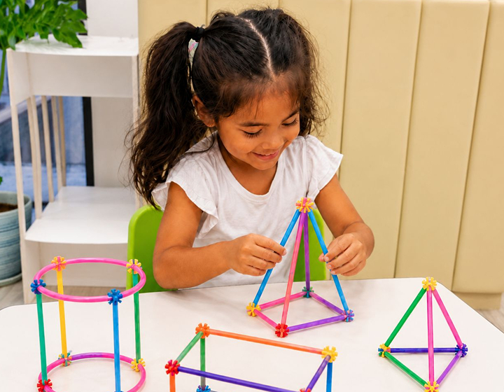 young girl learning angles in Growing IQ's unique classes that teach conceptual understanding