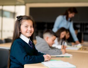 happy girl studying at a Hong Kong international school after parents paid debenture