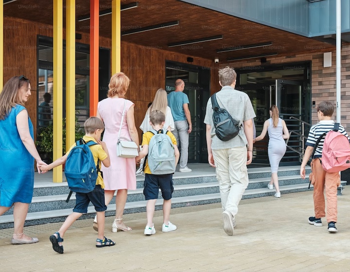 parents and students walk into a Hong Kong International school