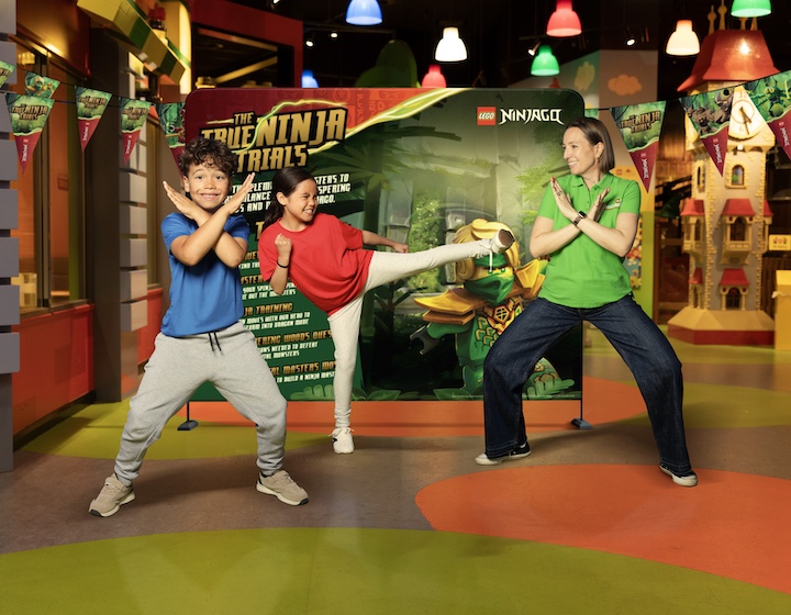 a family poses for a ninjago photo at Legoland discovery centre Hong Kong