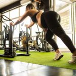 a pregnant woman does prenatal strength training at a gym in Hong Kong