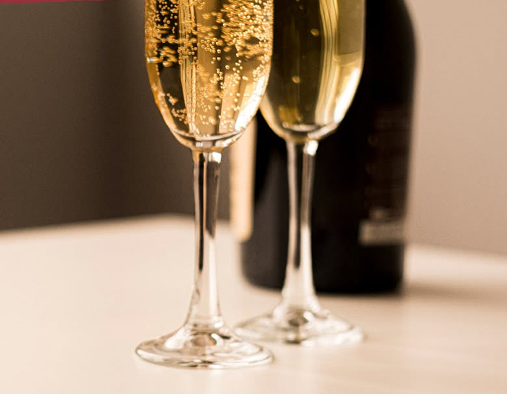 two champagne glasses and a bottle from Wine Not? Hong Kong, get free wine delivery on orders above $500 from Wine Not?