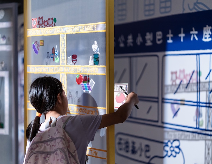 a child explores the in time exhibition as part of youth arts week in Hong Kong