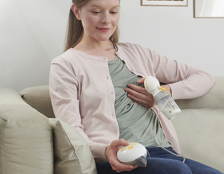 woman using Medela breast pump in Hong Kong, Medela freestyle, medela swing and medela symphony all available in HK