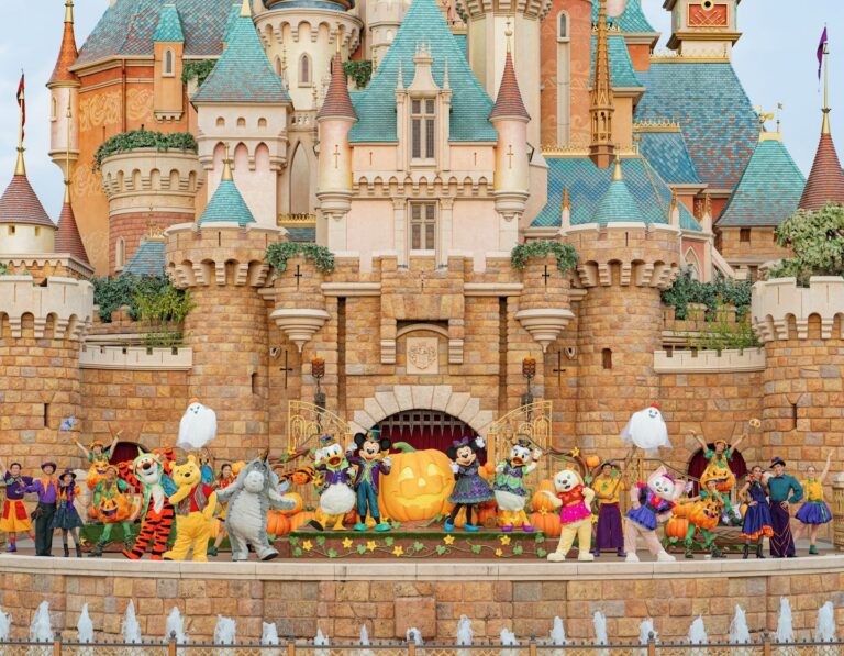 the cast of the Hong Kong Disneyland halloweentime show at the magic castle