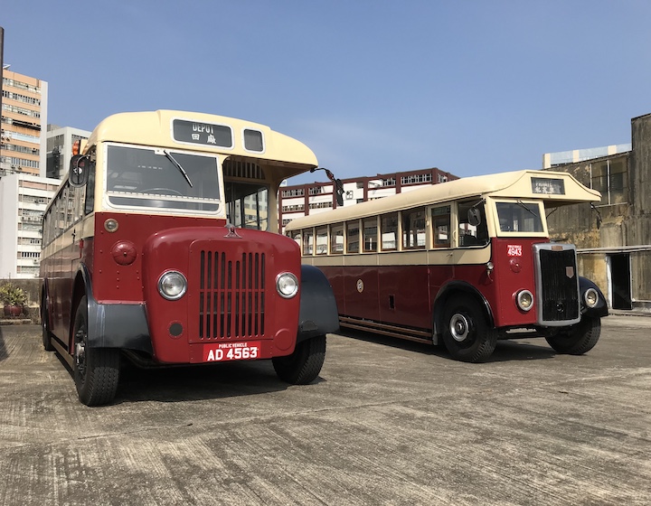 vintage buses parked on top of the mills in Hong Kong for children to visit.
