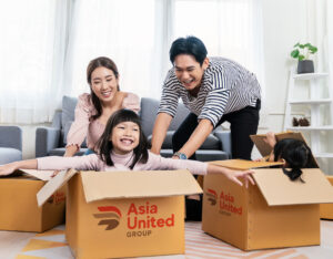 Family packing up their house to move with boxes from Asia United Group relocation company