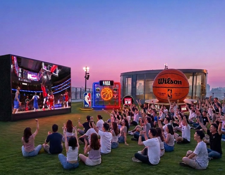 a crowd gathers to watch an NBA game on the rooftop of Megabox in Kowloon Bay