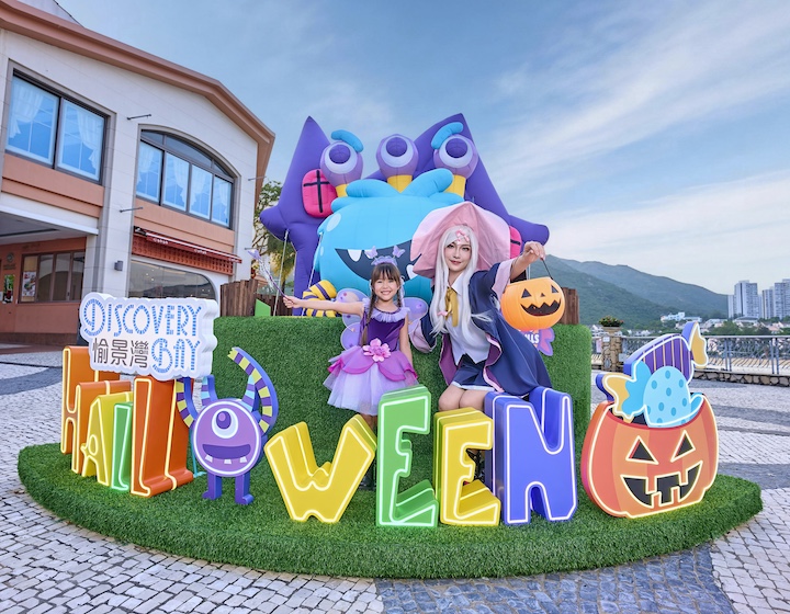 a mother and daughter dressed up in costumes for trick or treating in discovery bay