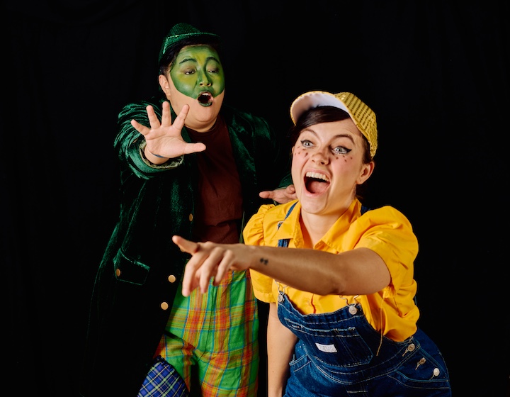 two actors perform in the annual Panto for HK Players