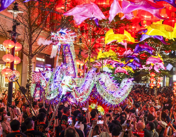 the led dragon makes its way through the crowds of Lee Tung Avenue in Wan Chai as part of the Mid-Autumn Festival Celebrations in Hong Kong 2026