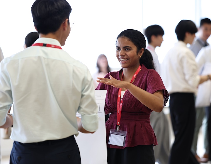 a student and teacher from Nord anglia international school Hong Kong interact on the first day at the new sixth form campus in Hung Hom