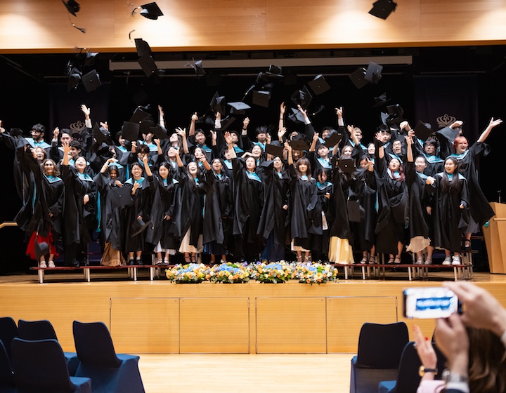 students from Nord anglia international school Hong Kong's sixth form celebrate graduation by throwing their caps